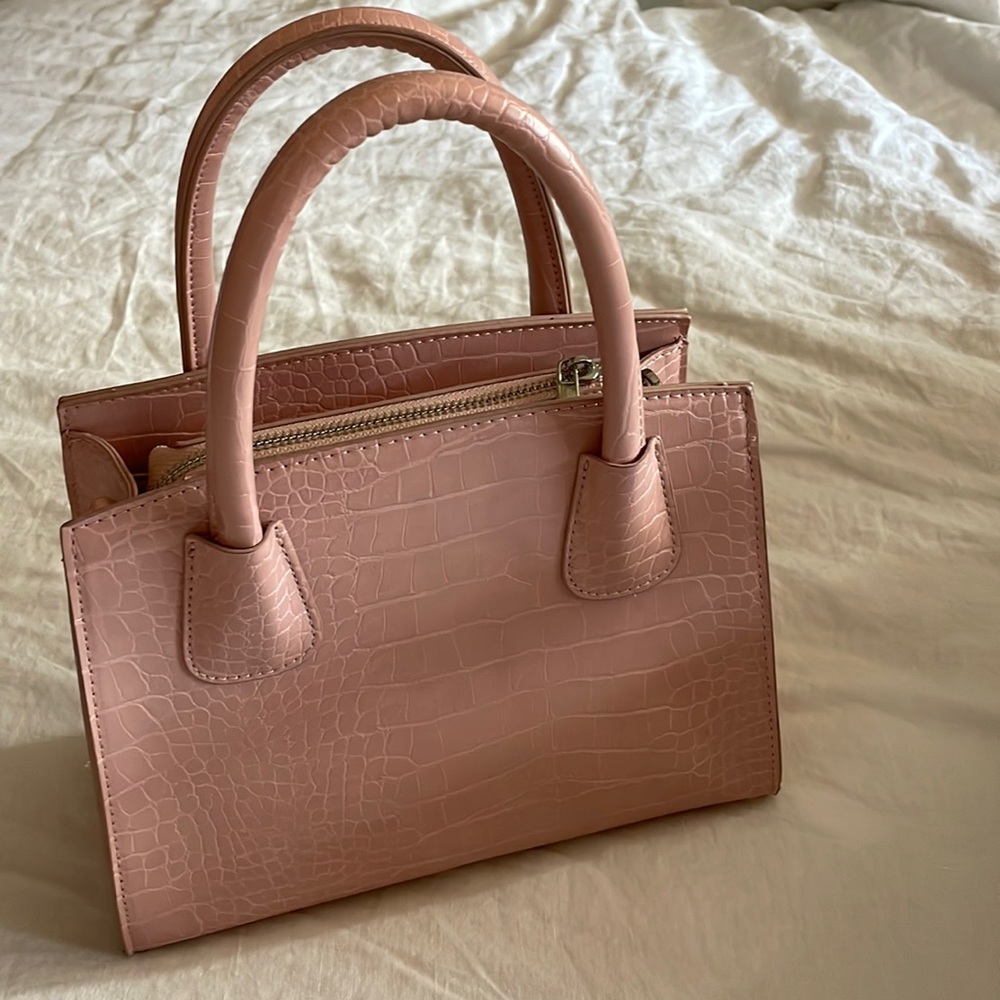 Pink crocodile purse